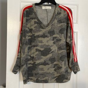 Vintage Havana camo fleece with red/cream strips.